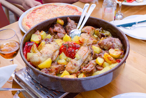 Croatian Peka of mixed meats and vegetables - image by Nadisja/shutterstock