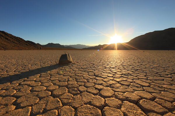 Death Valley sun over dry sand