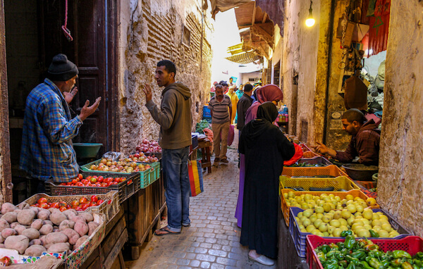 Fruit vendors in the Fez medina - image by Dino Geromella