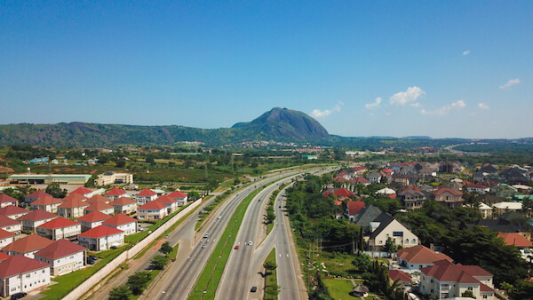 Abuja, Nigeria with Aso Rock - image by Tayvay/shutterstock.com