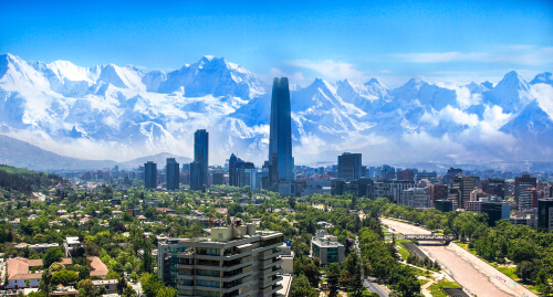 Santiago de Chile - capital city of Chile with Gran Torre building and snowy Andes mountains