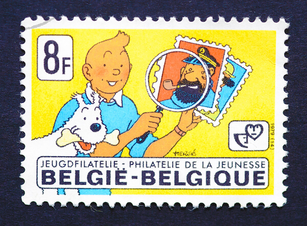 Stamp with Tintin, dog Snowy and Captain Haddock - image by Catwalker/shutterstock.com