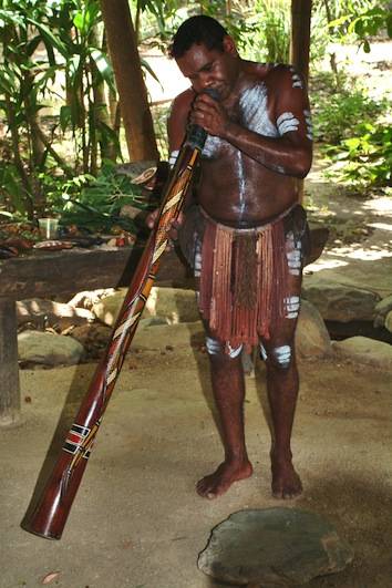 Australian playing the didgeridoo