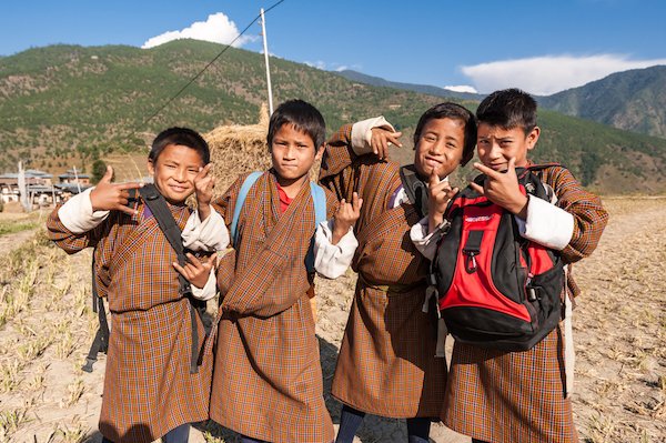 Happy children in Bhutan - image by gnohz/shutterstock.com