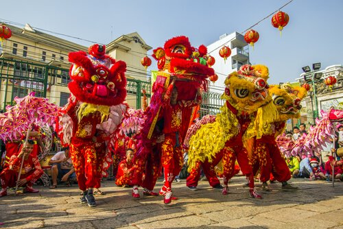 Lunar new year's dragon dance in Vietnam - image by Saigoneer/shutterstock.com