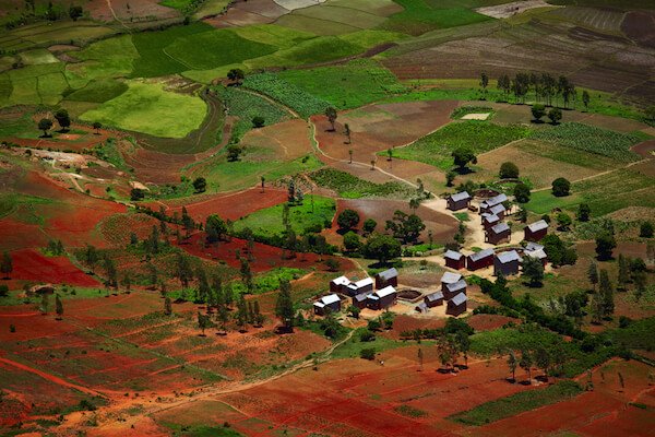 Malagasy village with typical red soil - Madagascar is often called the Great Red Island