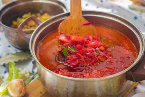 Red borscht soup in pot