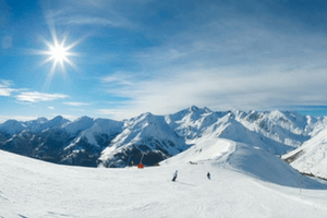 German Alps in snow with skiers